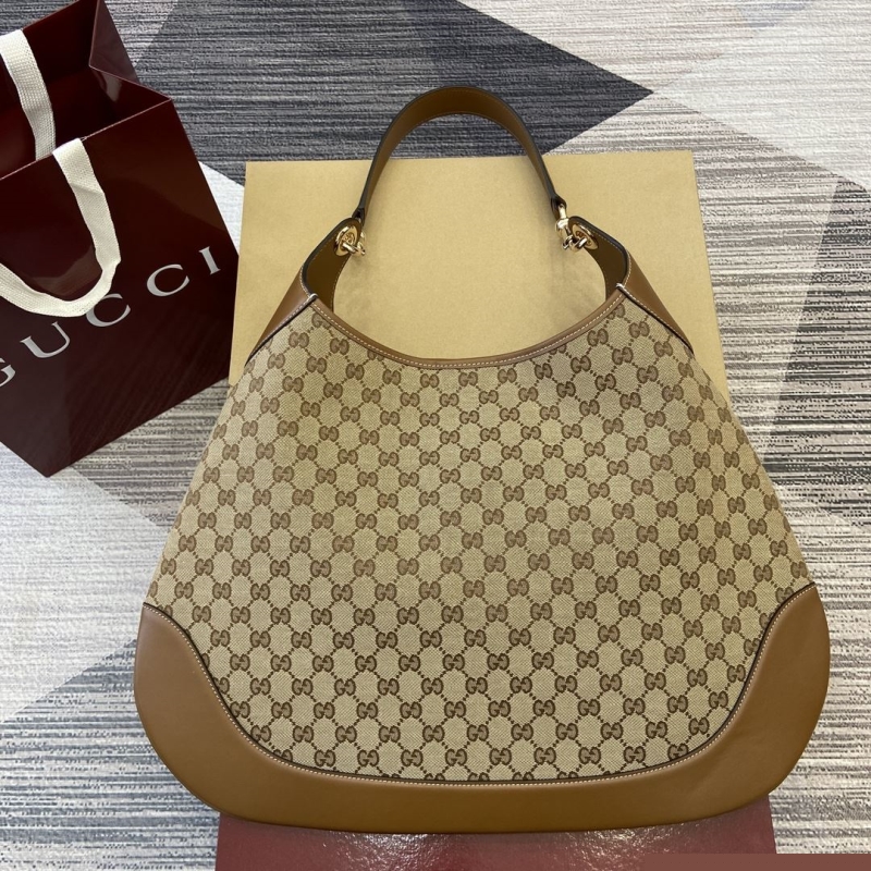 G*u*i top handle bags